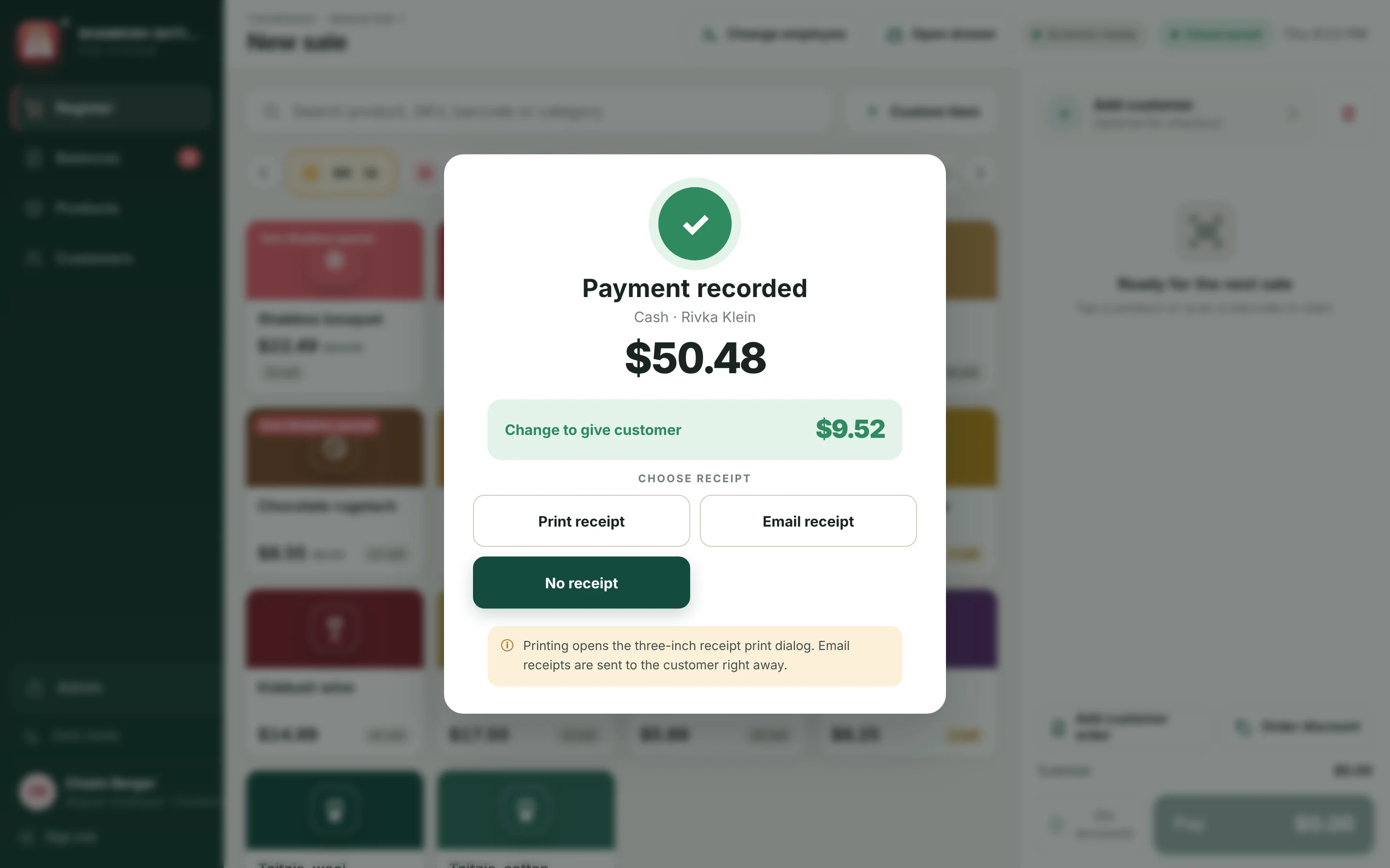 The payment recorded screen with change due and print, email or no receipt